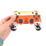 دسته بازی سونی مدل SONY PS4 DualShock4 High COPY CRASH سفید نارنجی - تصویر 2